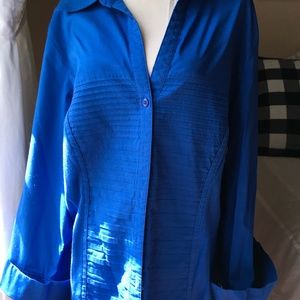 Poly spandex blue button down blouse with cuff sleeves
